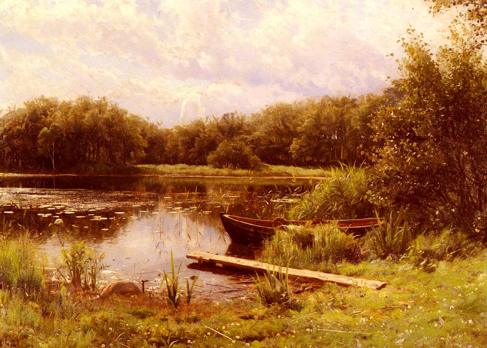 A Boat Moored On A Quiet Lak