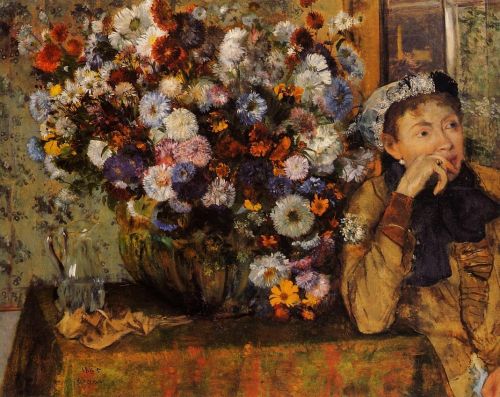 A Woman Seated beside a Vase of Flowers