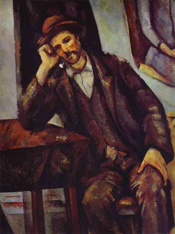 Man Smoking A Pipe