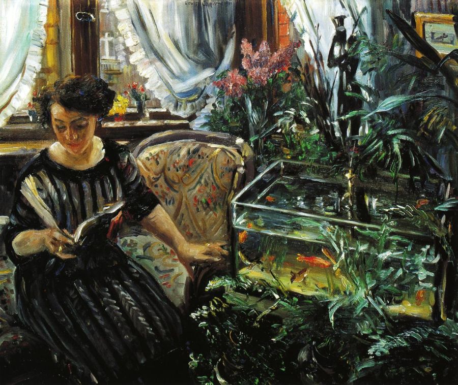 Woman by a Goldfish Tank