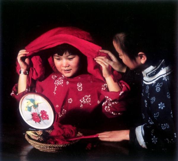 Children at Night with Red Cape