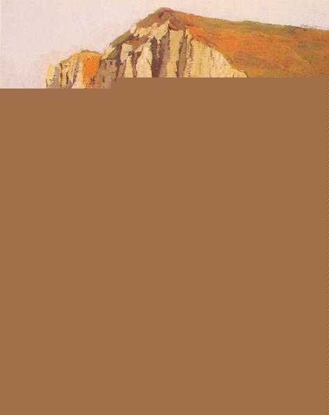 Boats at the foot of a cliff in Normandy